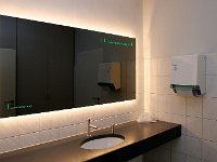 WireTap Indoor Lighting 05  Mirror in a washing room, illuminated with WireTap cable and colour change LED lights.